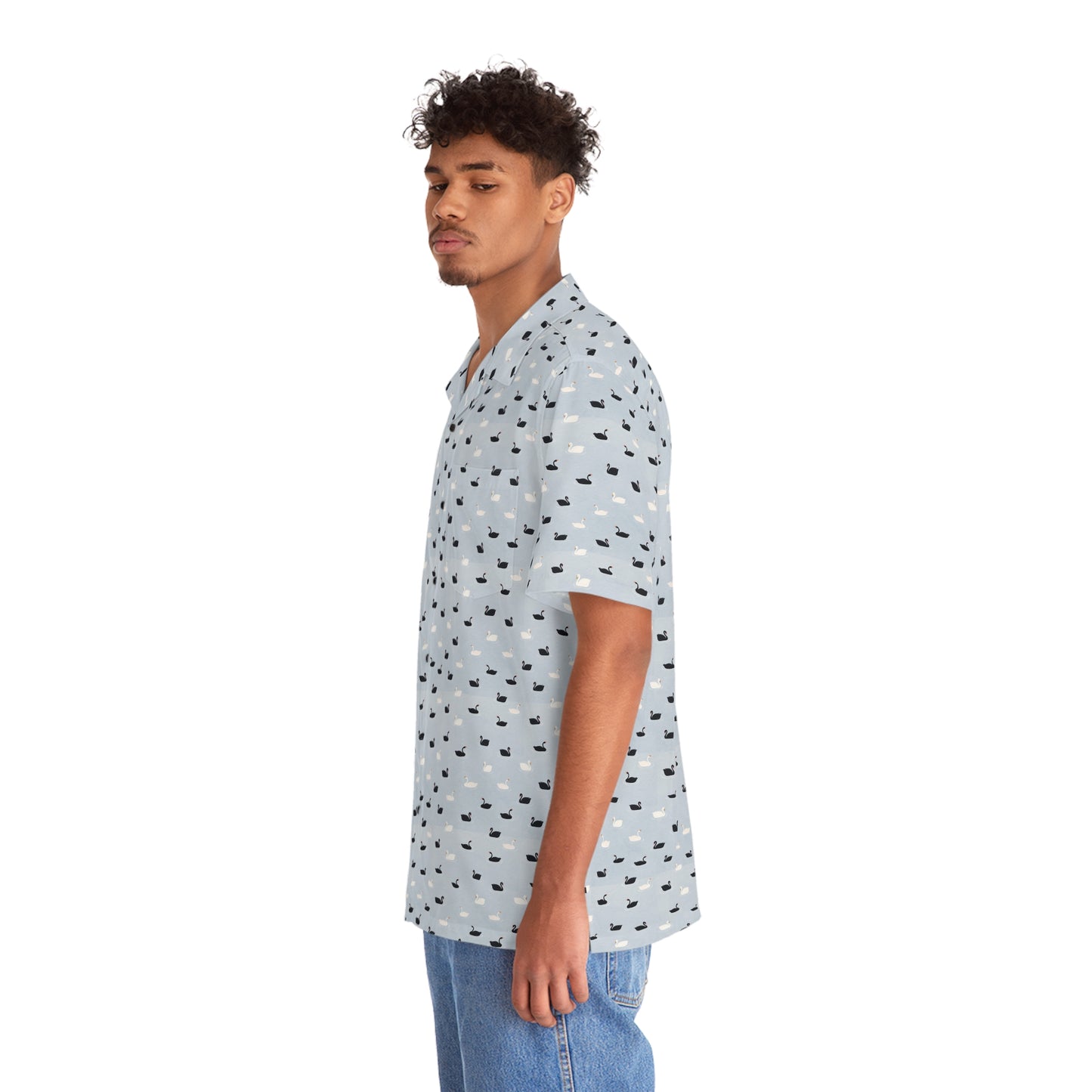 Black and White Swans - Carry On Crow Clothing Co. - young man stands sideways wearing black and white swan aloha shirt